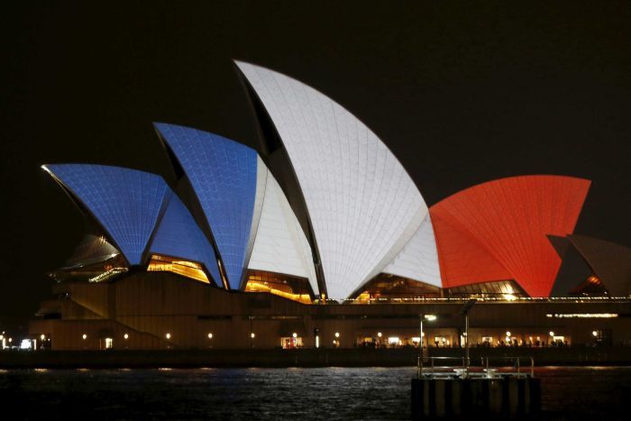 Sydney Opera House goes French in support for a nation and world that mourns. Photo Reuters: Jason Reed